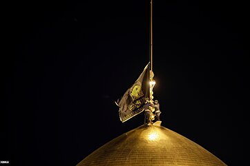 Imam Reza Shrine Hoists Black Flag to Mourn Gaza Hospital Massacre
