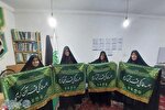عکس | اهدای پرچم جلسات خانگی قرآن به فعالان قرآنی خان‌ببین